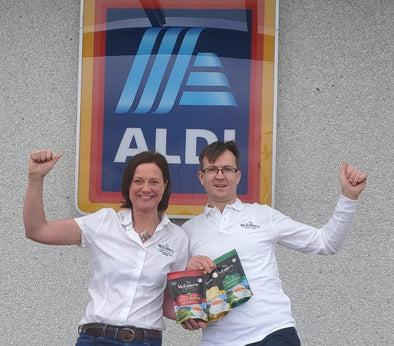 Donal & Helen outside Aldi with the three loose Irish Tea products that will be in store on 6th June